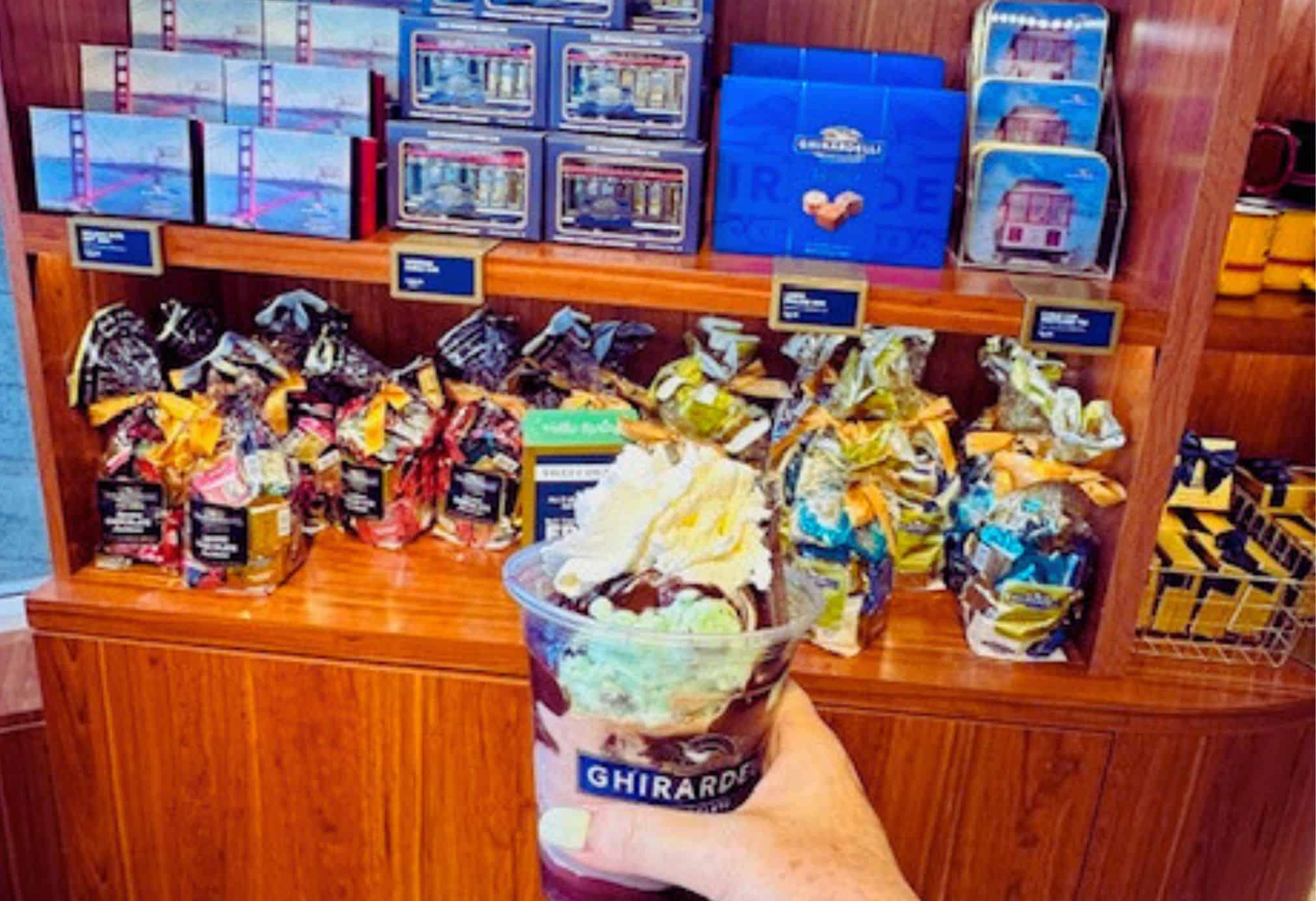 Ghirardelli sundae with hot fudge, whipped cream, and chocolate chunks inside the Ghirardelli Chocolate Shop in San Francisco
