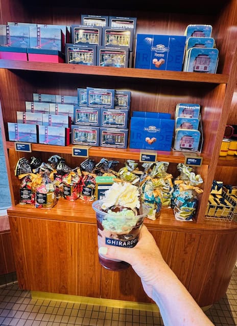 Ghirardelli sundae with hot fudge, whipped cream, and chocolate chunks inside the Ghirardelli Chocolate Shop in San Francisco