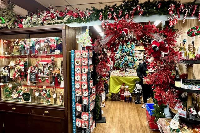 Festive Christmas shop filled with holiday decorations, ornaments, nutcrackers, wreaths, and twinkling lights, inspiring classic Christmas things to do during the holiday season.