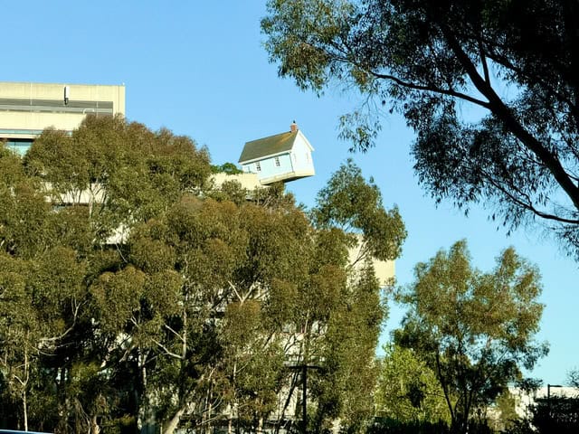 The Stuart Collection’s upside-down house art installation at UC San Diego surrounded by eucalyptus trees in La Jolla, California