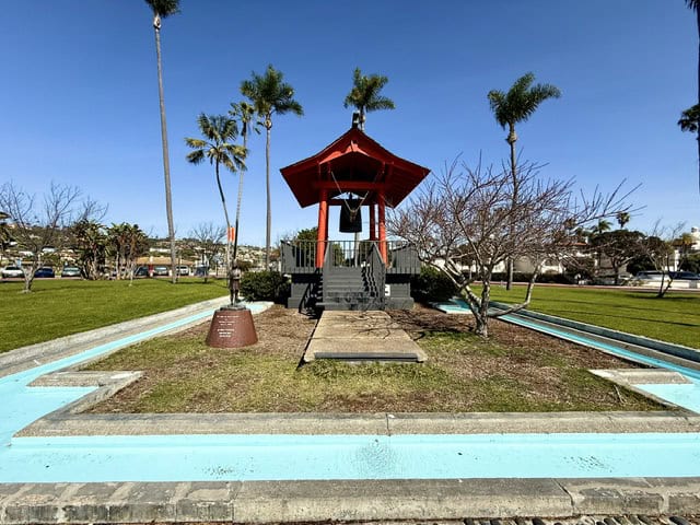 Friendship Bell at Shelter Island in San Diego surrounded by palm trees