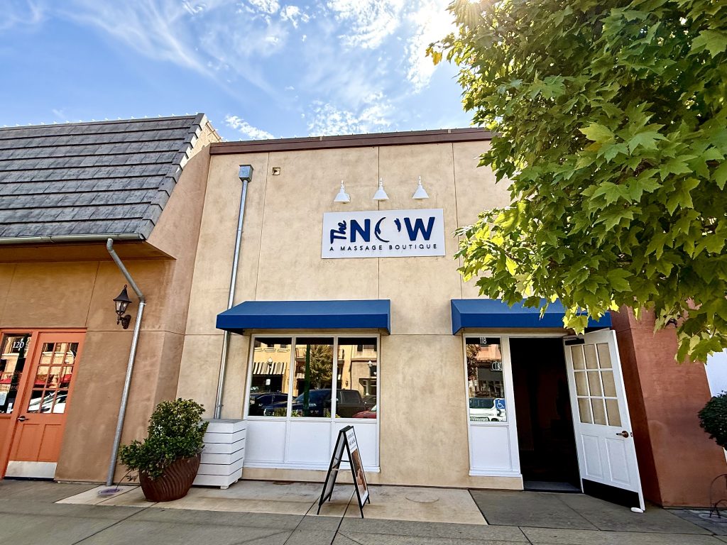 The NOW Massage boutique in El Dorado Hills, California, with its storefront and entrance